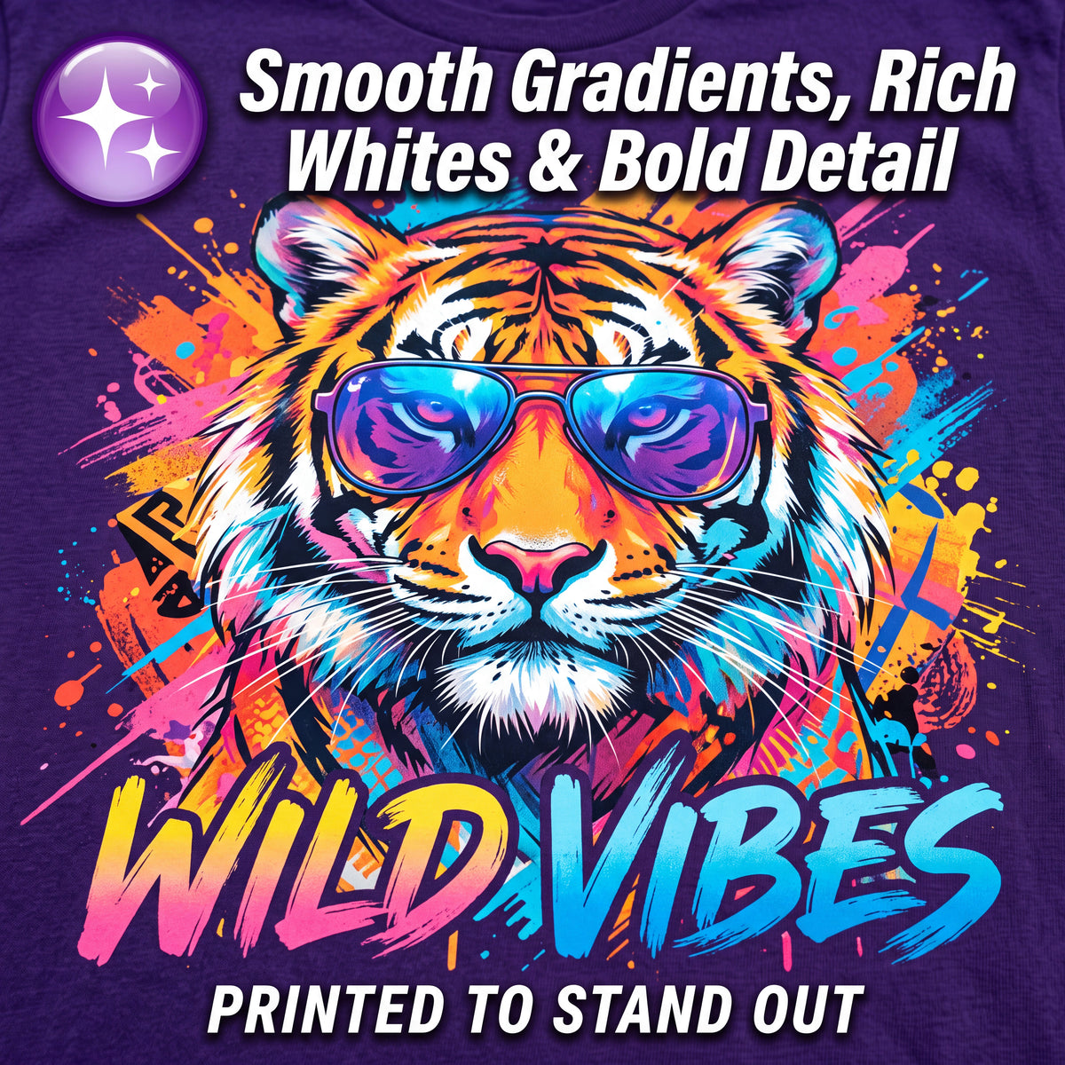 A purple graphic T-shirt design featuring a stylized tiger face wearing blue-purple sunglasses, surrounded by bright paint splashes and the words 'WILD VIBES' and 'PRINTED TO STAND OUT.' Large marketing text at the top reads 'Smooth Gradients, Rich Whites & Bold Detail.