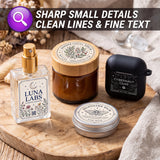 Four styled products arranged on a wooden tray: a clear perfume bottle labeled Luna Labs with a gold sprayer, an amber jar with a bamboo lid labeled Rhinowalk Facial Serum, a black case labeled Cybernaut Gear, and a small silver tin labeled Rhinowalk Balm. A banner at the top reads 'SHARP SMALL DETAILS CLEAN LINES & FINE TEXT' with a purple magnifying icon.